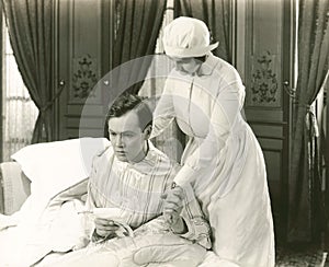 Nurse consoles her patient