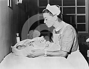 Nurse with crying baby