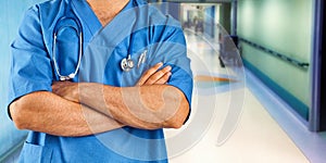 Nurse or doctor with blue jacket in the hospital ward.