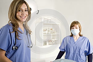 Nurse and doctor in hospital room