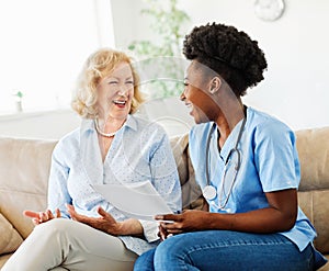 nurse doctor senior care caregiver help assistence retirement home nursing elderly man woman health support african