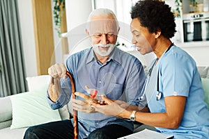 nurse doctor senior care caregiver help assistence retirement home nursing elderly woman man health surine test bottle