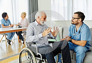 nurse doctor senior care caregiver help assistence wheelchair retirement home nursing elderly woman disabled disability