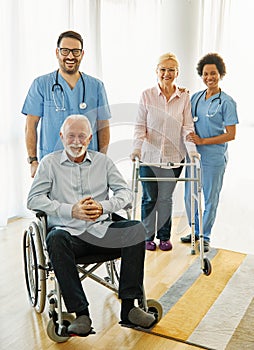 nurse doctor senior care caregiver help assistence wheelchair retirement home nursing elderly woman disabled disability