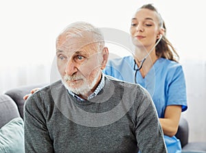 nurse doctor senior care caregiver help check exam assistence retirement home stethoscope nursing elderly man woman