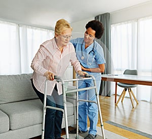nurse doctor senior care caregiver help walker assistence retirement home nursing elderly woman black african american