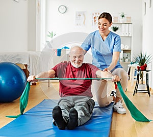 nurse doctor senior care exercise physical therapy exercising help assistence retirement home physiotherapy strech band