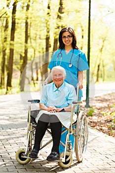 Nurse with elderly Lady in Wheelchair