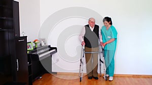 Nurse and Elderly Senior Man Using Walking Frame