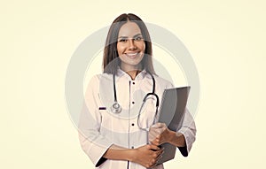 nurse with emedicine laptop in studio. photo of nurse hold laptop for emedicine wear white coat
