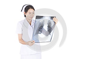 Nurse examine patient data from medical x-ray film