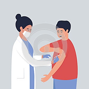 A nurse gives a vaccine to a man