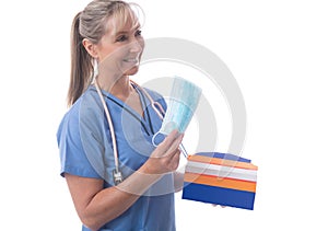 A nurse handing out medical masks