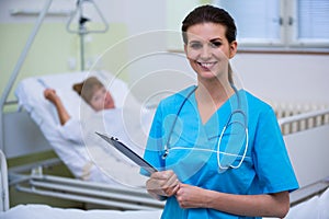 Nurse holding a clipboard