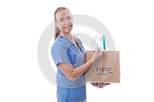 Nurse holding a delivered box of much needed N95 medical masks photo