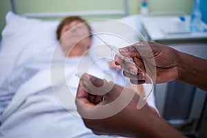 Nurse holding iv drip