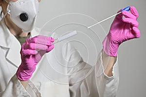 Nurse Holds A Swab For The Coronavirus Test