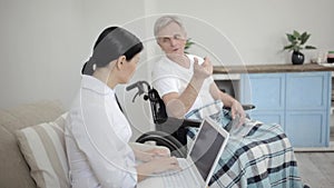 Nurse looking after disabled man