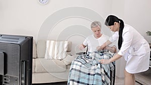 Nurse looking after disabled man