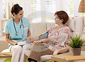 Nurse measuring blood pressure