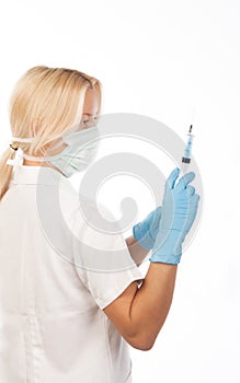 Nurse with medical syringe