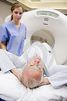 Nurse With Patient Having CAT Scan