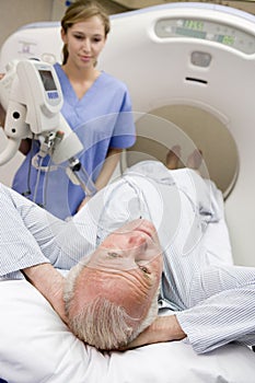 Nurse With Patient Having CAT Scan