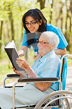 Nurse and Patient Reading