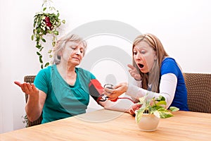 Nurse and patient are surprised by the blood pressure