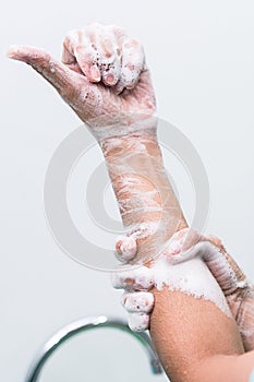 Nurse perform surgical hand washing, Preparation to the operating room. Closed-up of the hands.