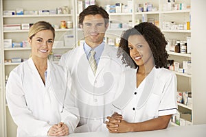 Nurse and pharmacists working in pharmacy