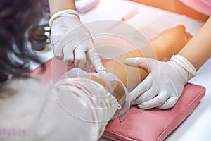 Nurse prepare drawing blood sample from arm patient for blood test