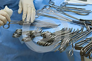 Nurse prepares surgical tools