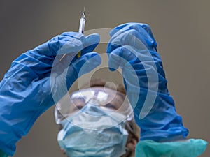 A nurse prepares the vaccine against the Coronavirus Covid 19 to inoculate it to a patient