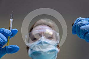 A nurse prepares the vaccine against the Coronavirus Covid 19 to inoculate it to a patient