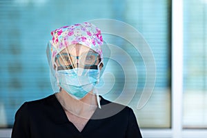 Nurse with protective N95 mask in a hospital