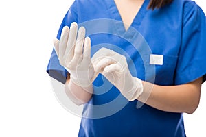 Nurse putting on some gloves photo