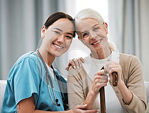 Nurse, senior woman and sofa for portrait, walking stick and smile together with happiness, chat and care. Elderly