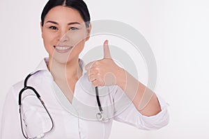 Nurse showing thumbs up.