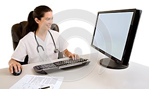 Nurse Sitting and Working at her Computer