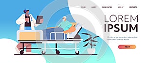 nurse taking care of sick senior man patient lying in hospital bed care service concept horizontal