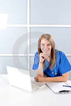 Nurse thinking in a modern office