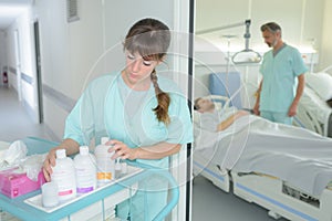 Nurse with trolley in hallway while doctor assisting patient