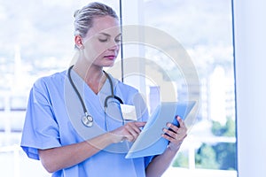 Nurse using her tablet pc