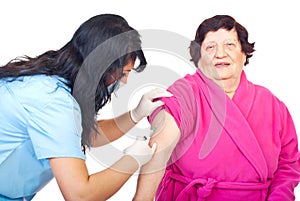 Nurse vaccine elderly woman patient