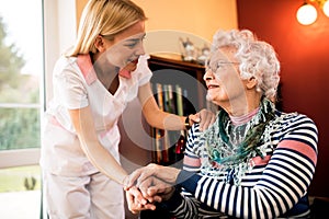 Nurse visit her senior patient at home