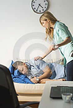 Nurse waking up surgeon