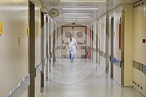 Nurse walking in Hospital Corridor