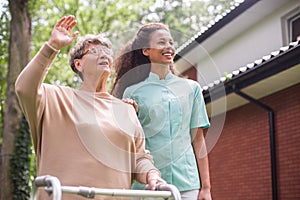 Nurse walking with patient