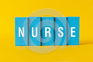 Nurse - word concept on building blocks, text